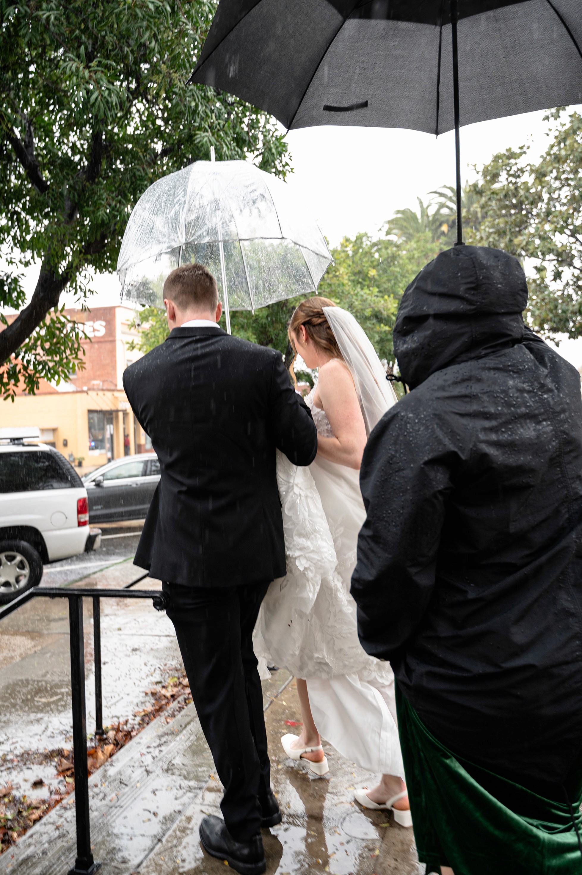 Flat lay wedding details with bouquet, rings, and sparkling bridal heels