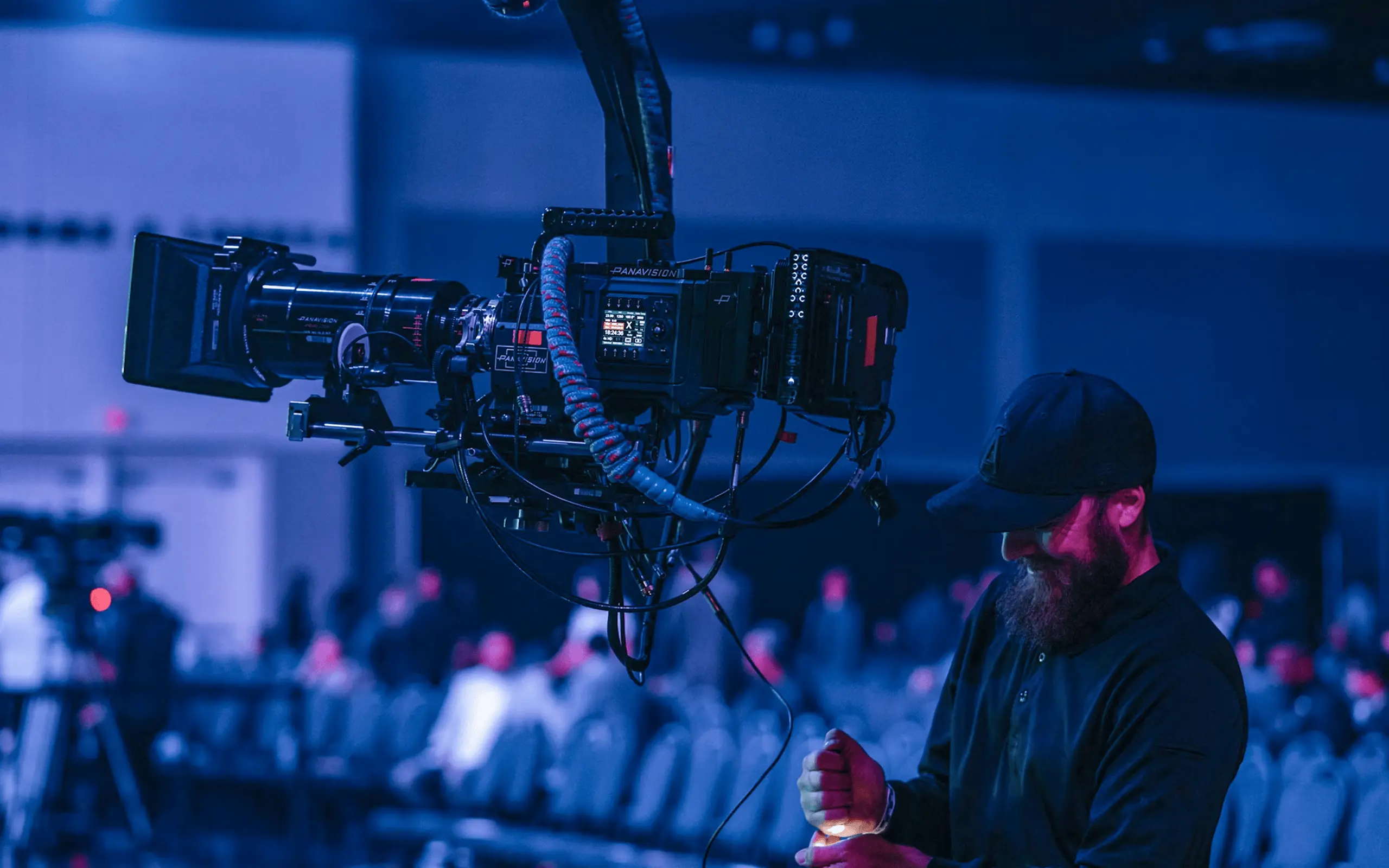 Film camera mounted on a stabilised rig in a studio.