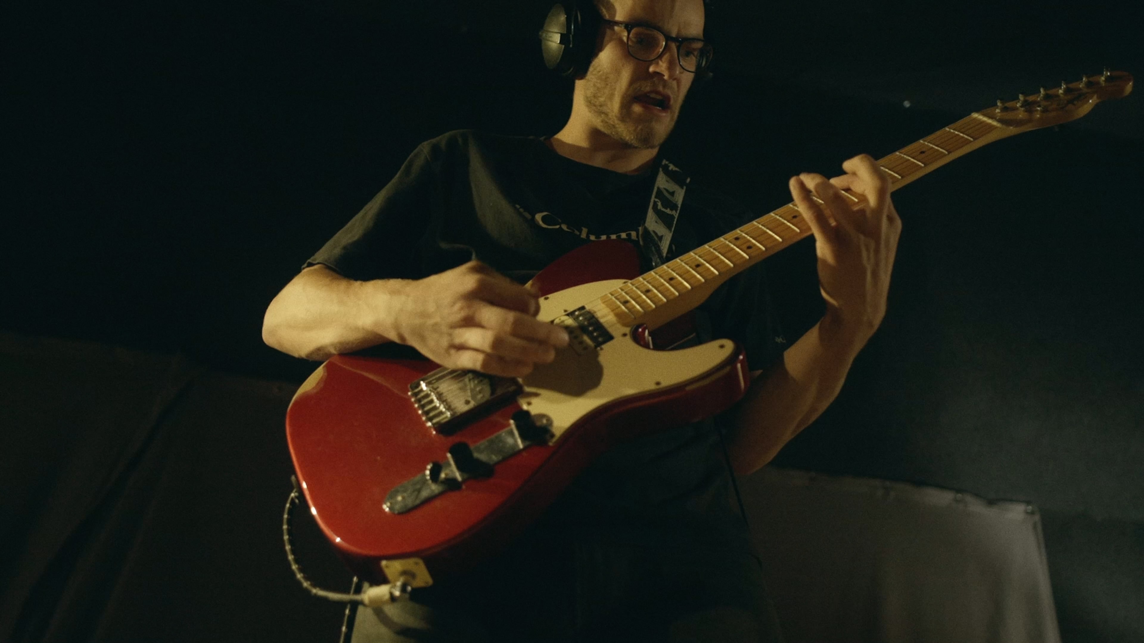guitar-player with glasses