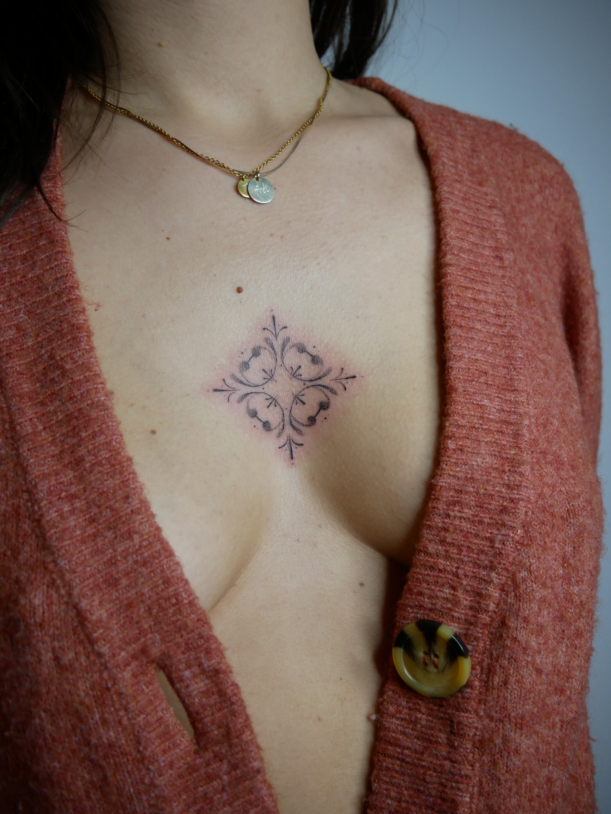 Fineline Handpoke Mandala Tattoo on sternum by Artist Chiara