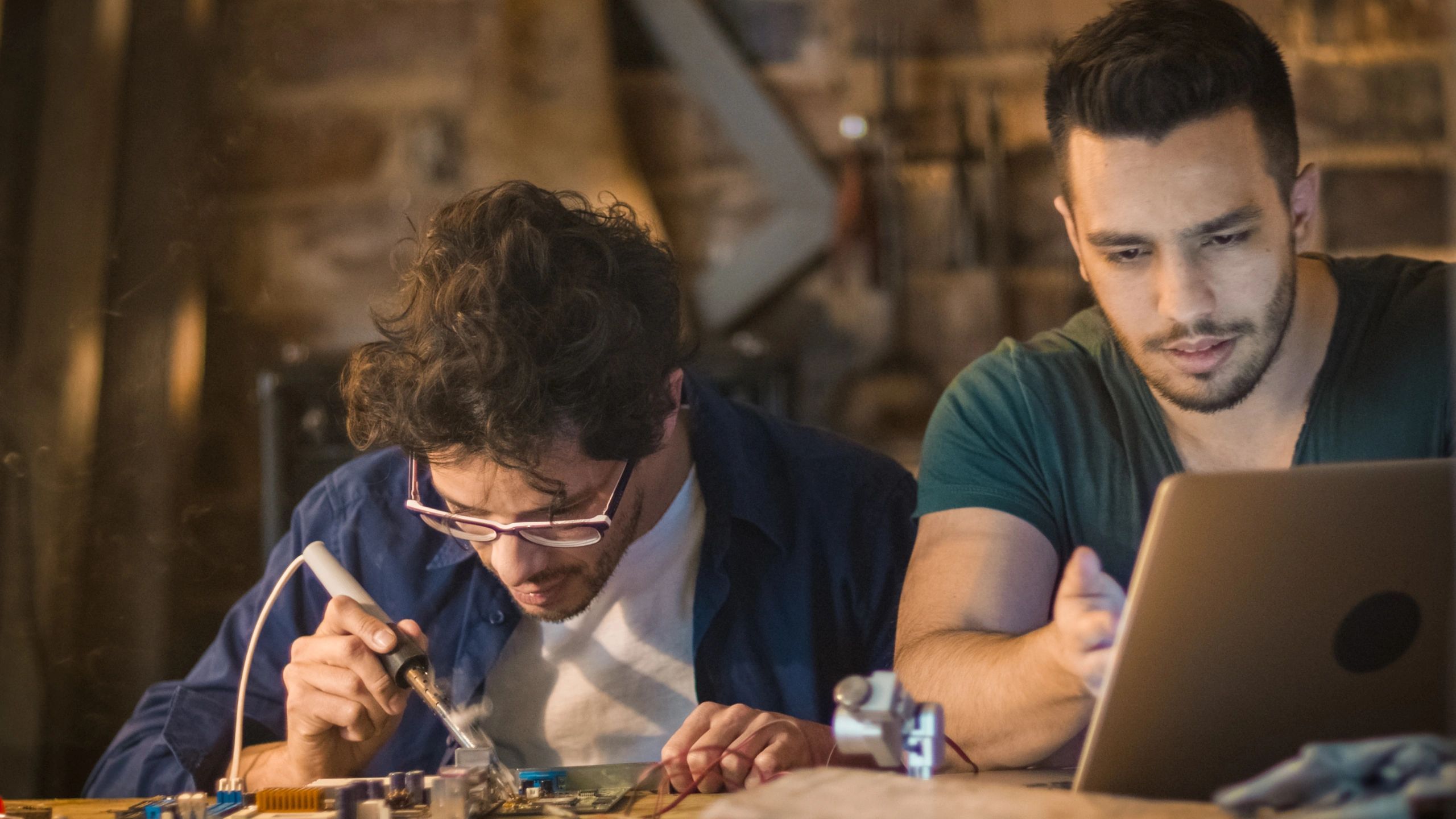 a black and white living room with a large tv