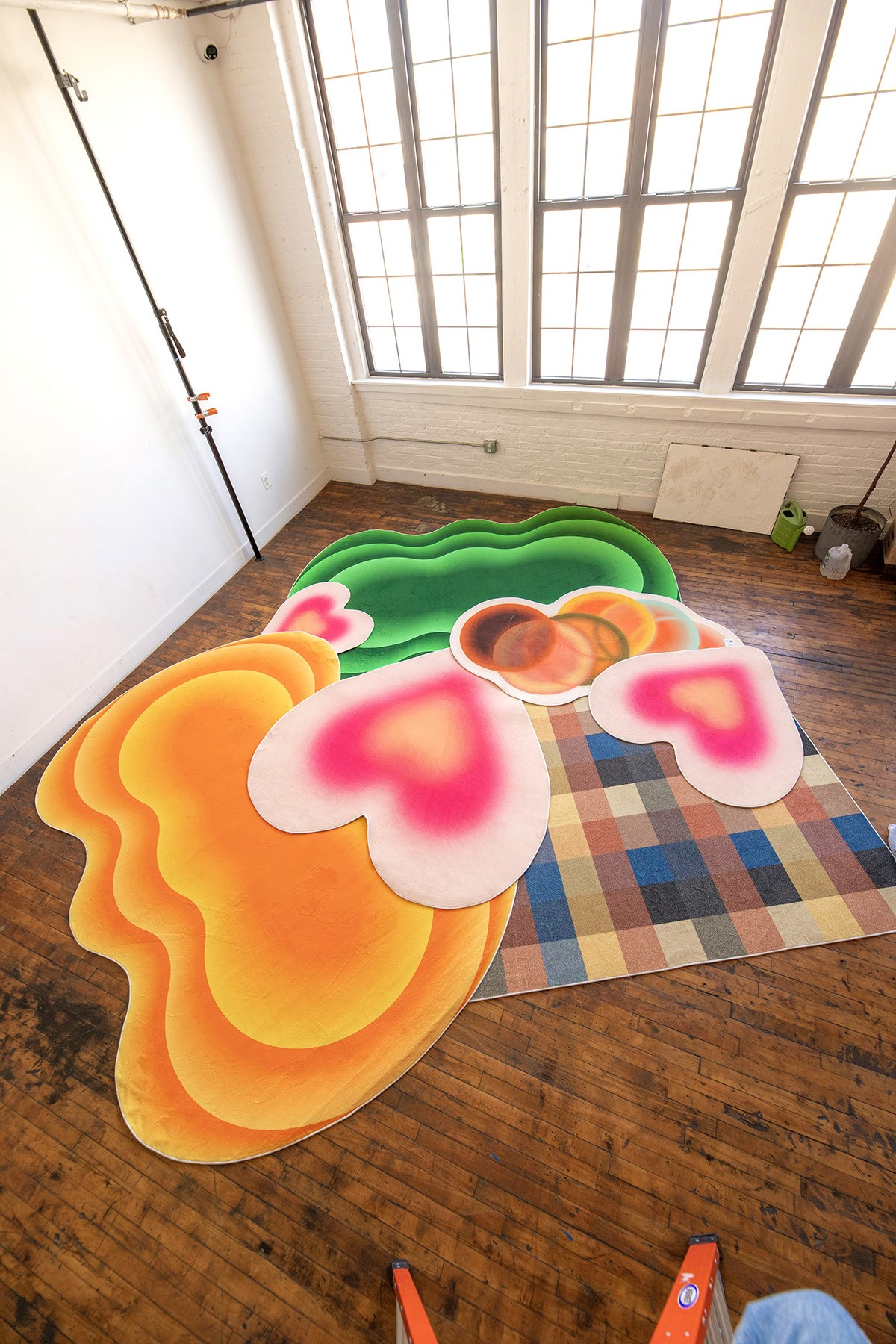 Design support for Home With Juan's first line of rugs.