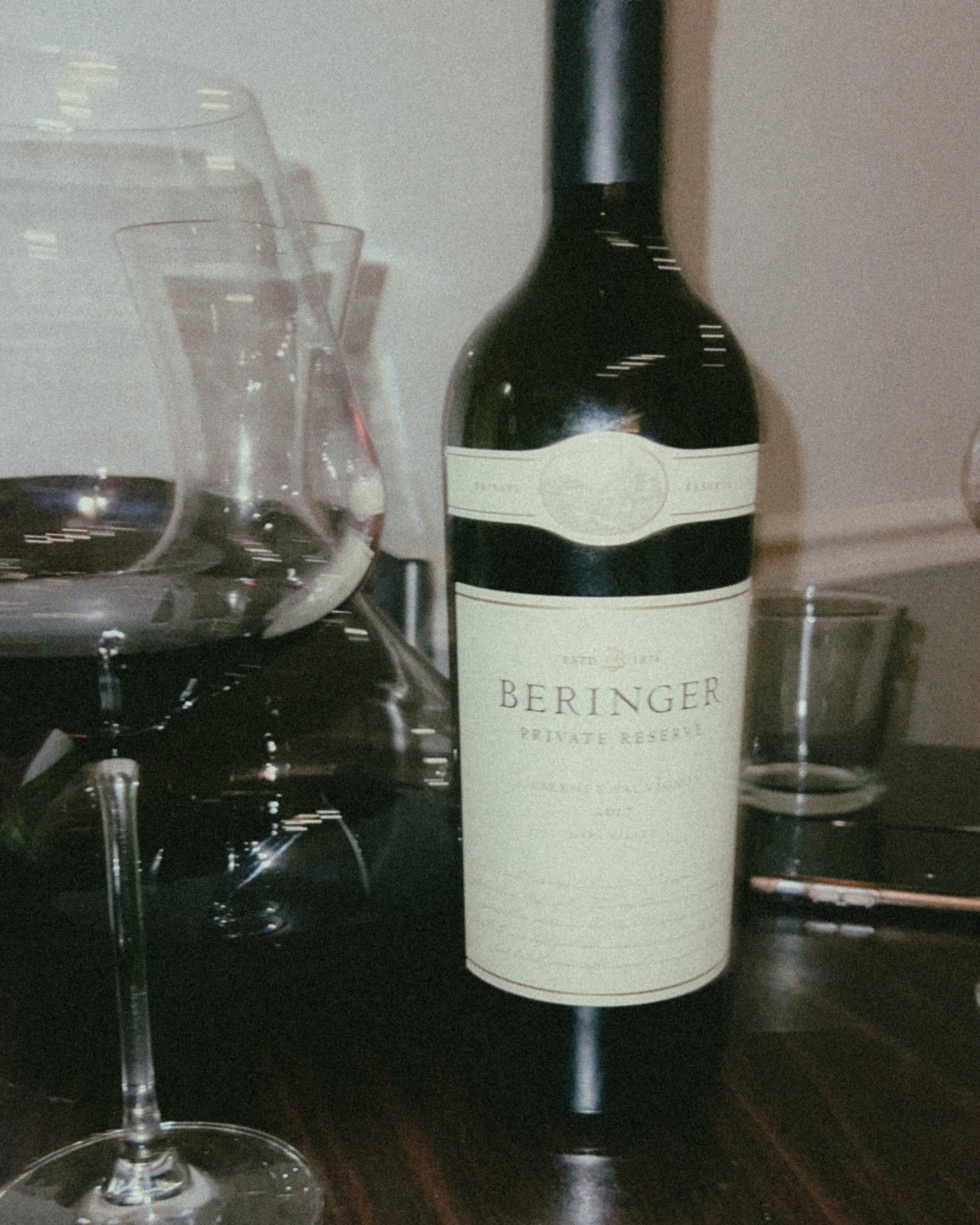 Person sitting on a ledge overlooking New York City skyline