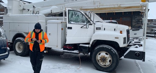 carkeyaction automotive locksmith repairing door lock on a commercial vehicle in Calgary