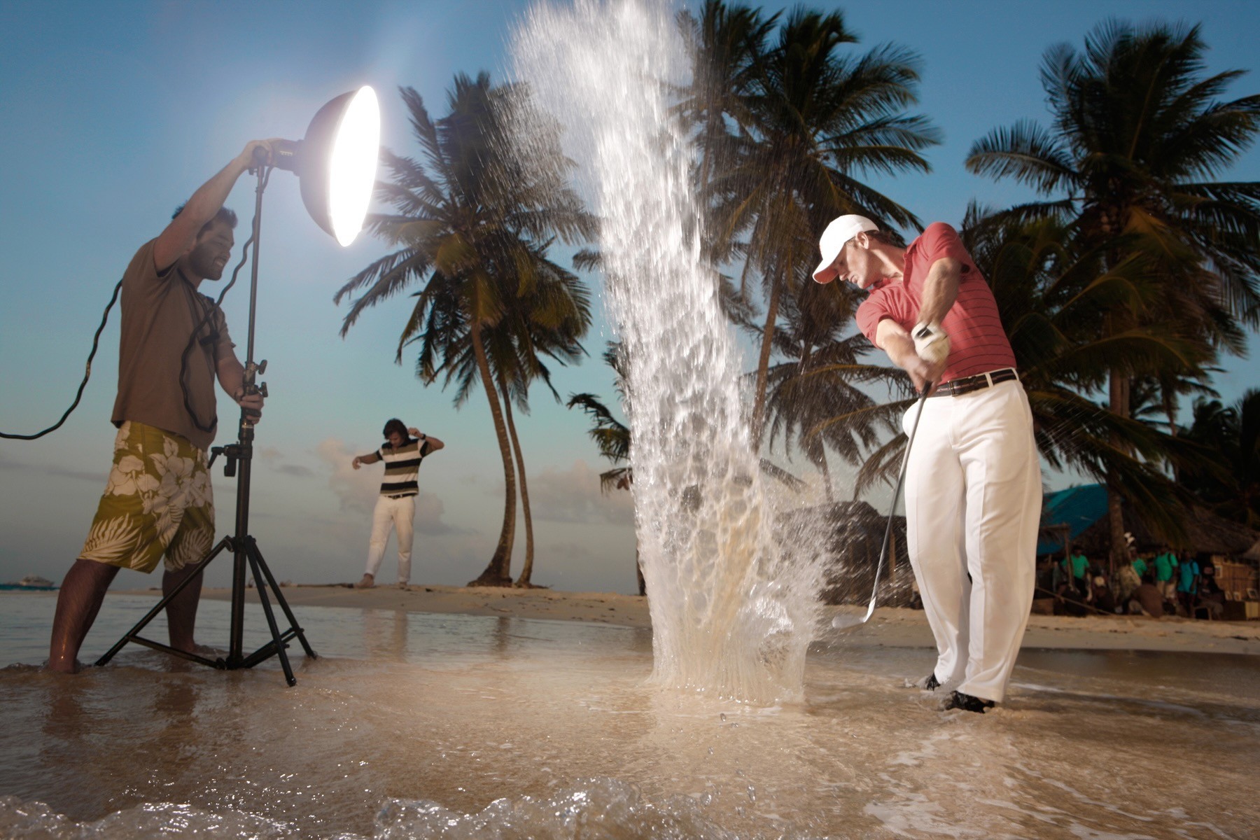 Beach golf production with strobe lighting