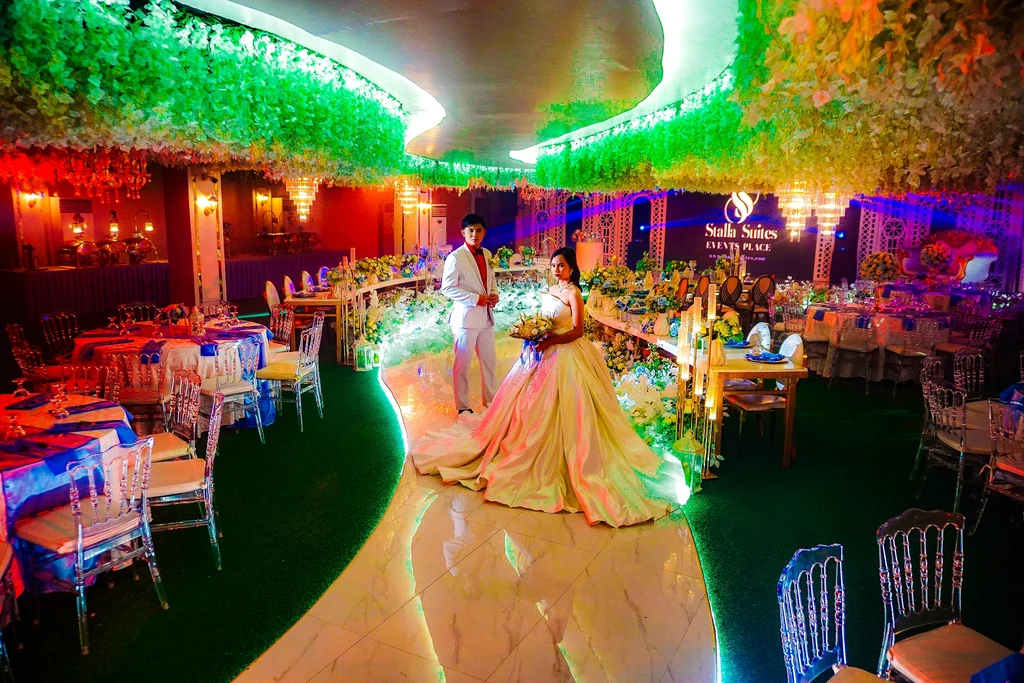 Newlyweds walking through their reception at Celestia Hall, Quezon City