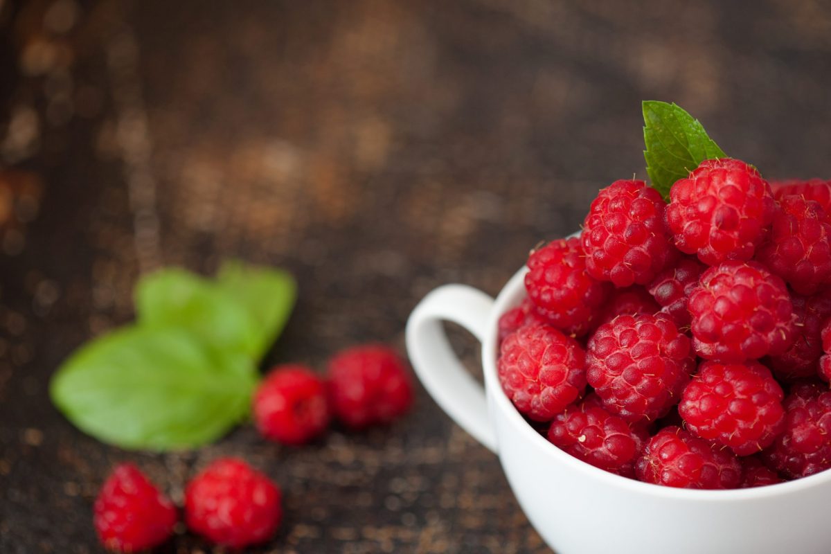 A bowl of raspberries.