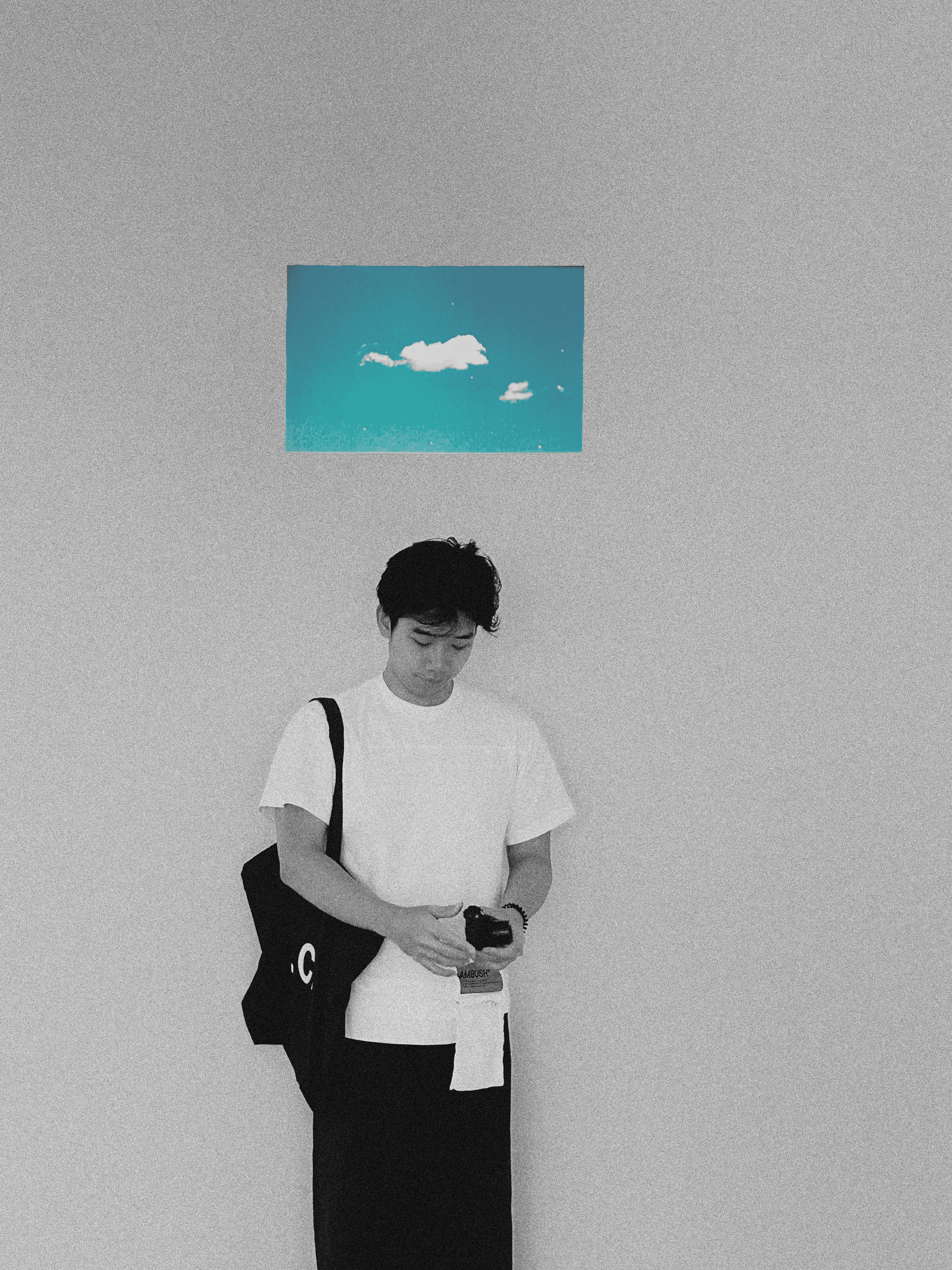 a blurry photo of a person standing in front of a wall