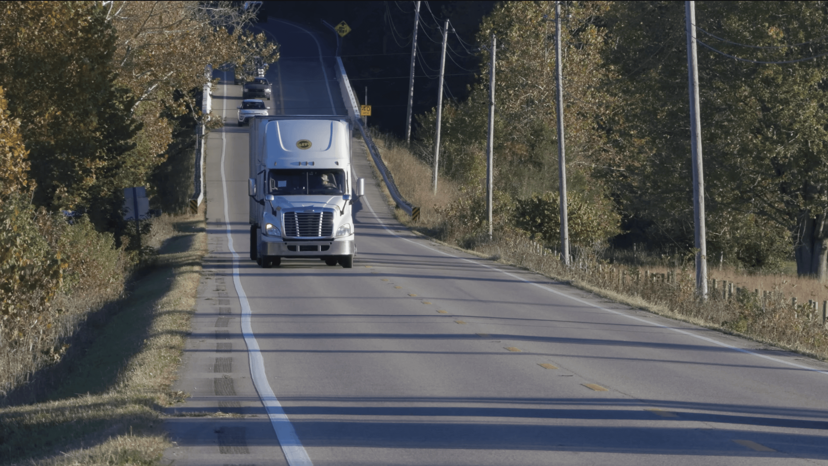 Minimalist coffee can design in hand – black and white packaging with bold typography