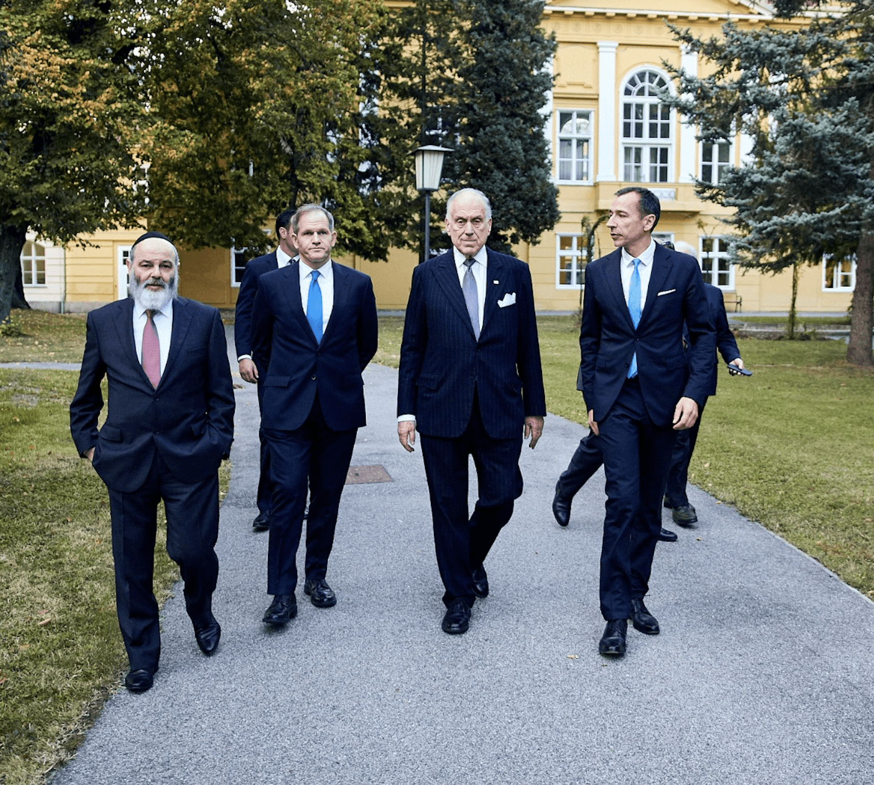 Instructor presenting to students in a modern classroom at Lauder Business School (LBS)