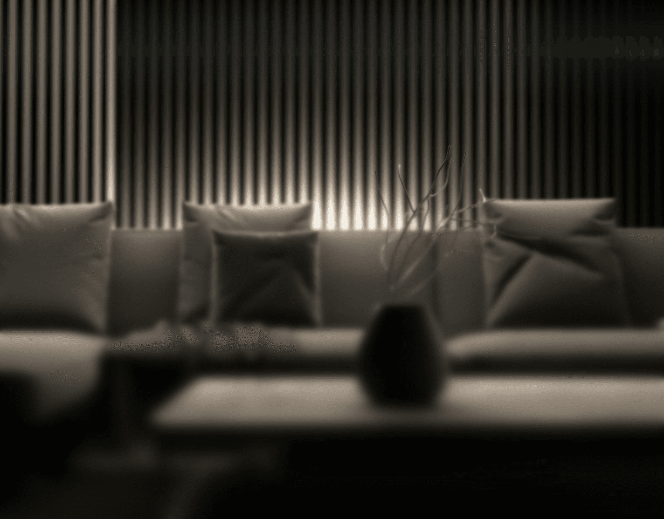 a black and white photo of a living room