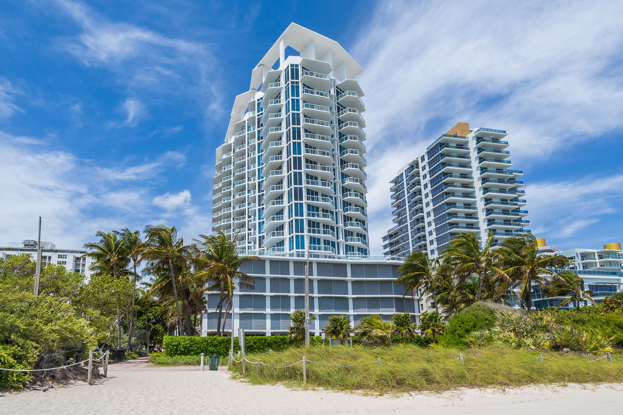 flat lay shot of spa amenities by the bathtub