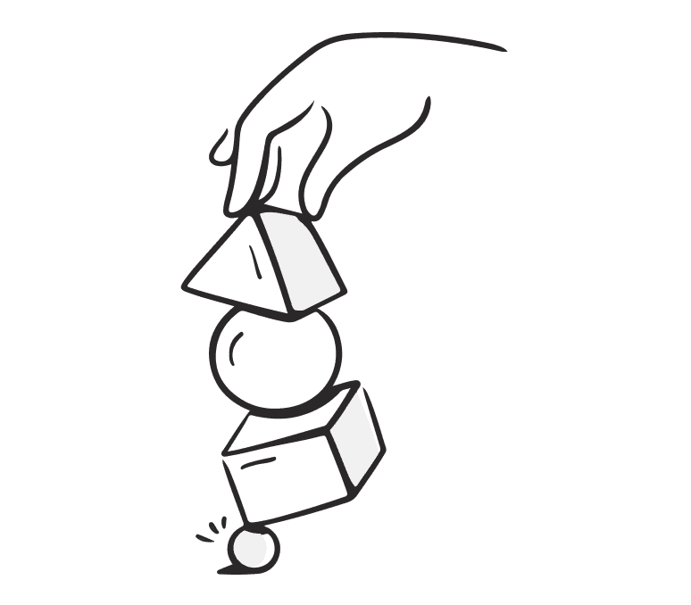 A hand holds a cube and a ball, showcasing a playful interaction between geometric shapes.