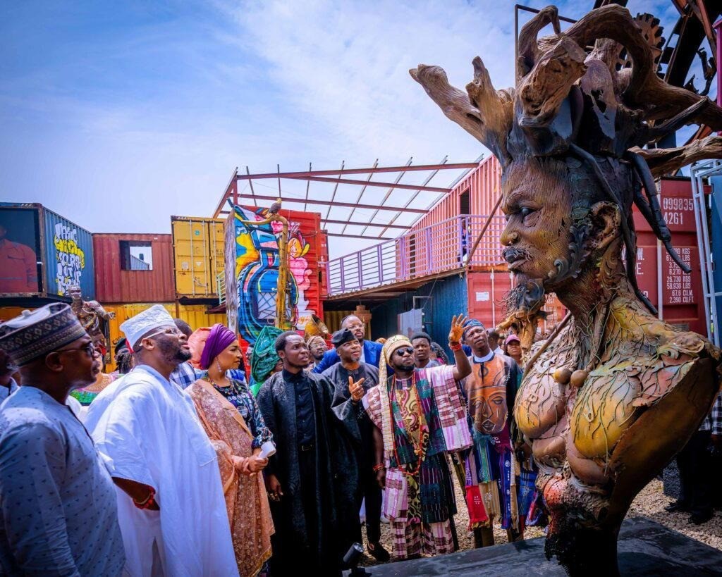 Visitors at Reclaimed Beauty: A Dialogue Between Continents, The Village by Tikera, Idu, Abuja, 2026. ARTWORK © DOTUN POPOOLA. COURTESY THE VILLAGE BY TIKERA.