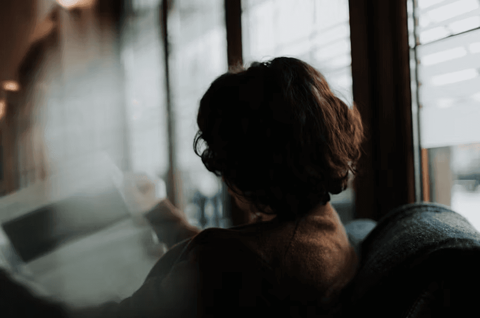 Rows of empty green stadium seats viewed from above, forming a repeating pattern — representing scale, audience reach, and how strong B2B brand impact is built by engaging the right accounts at scale rather than everyone at once.