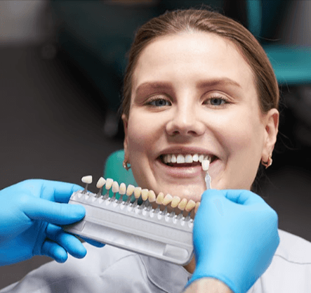Woman undergoing a procedure to have porcelain veneers fitted