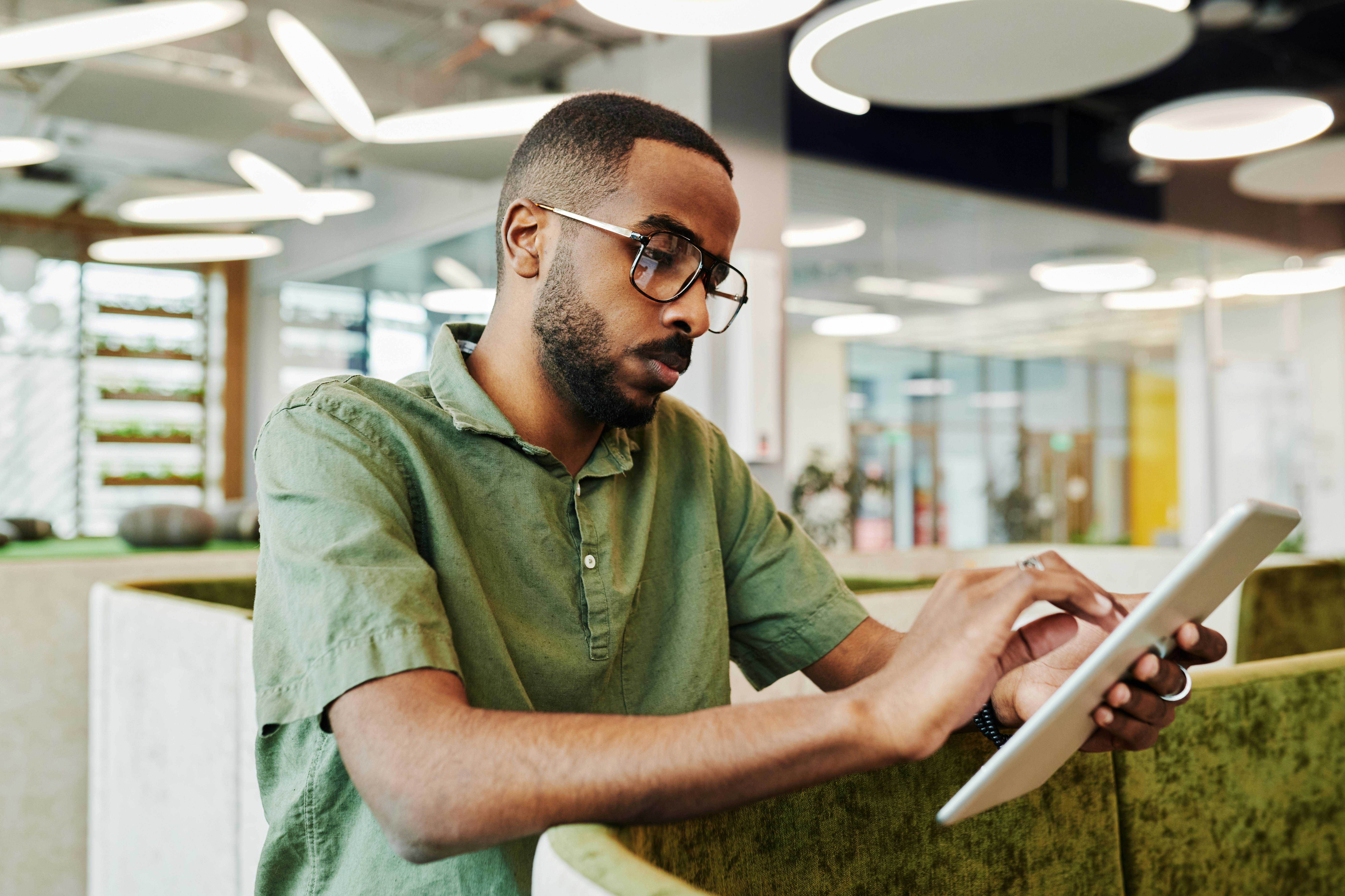 black man using ipad