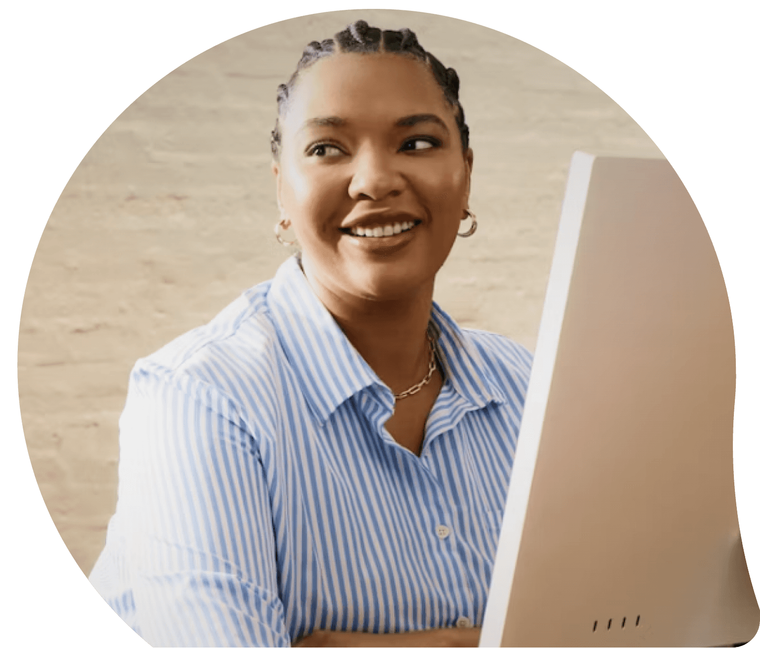woman, remote worker, working at her computer, secure and confident because she uses Sidekick