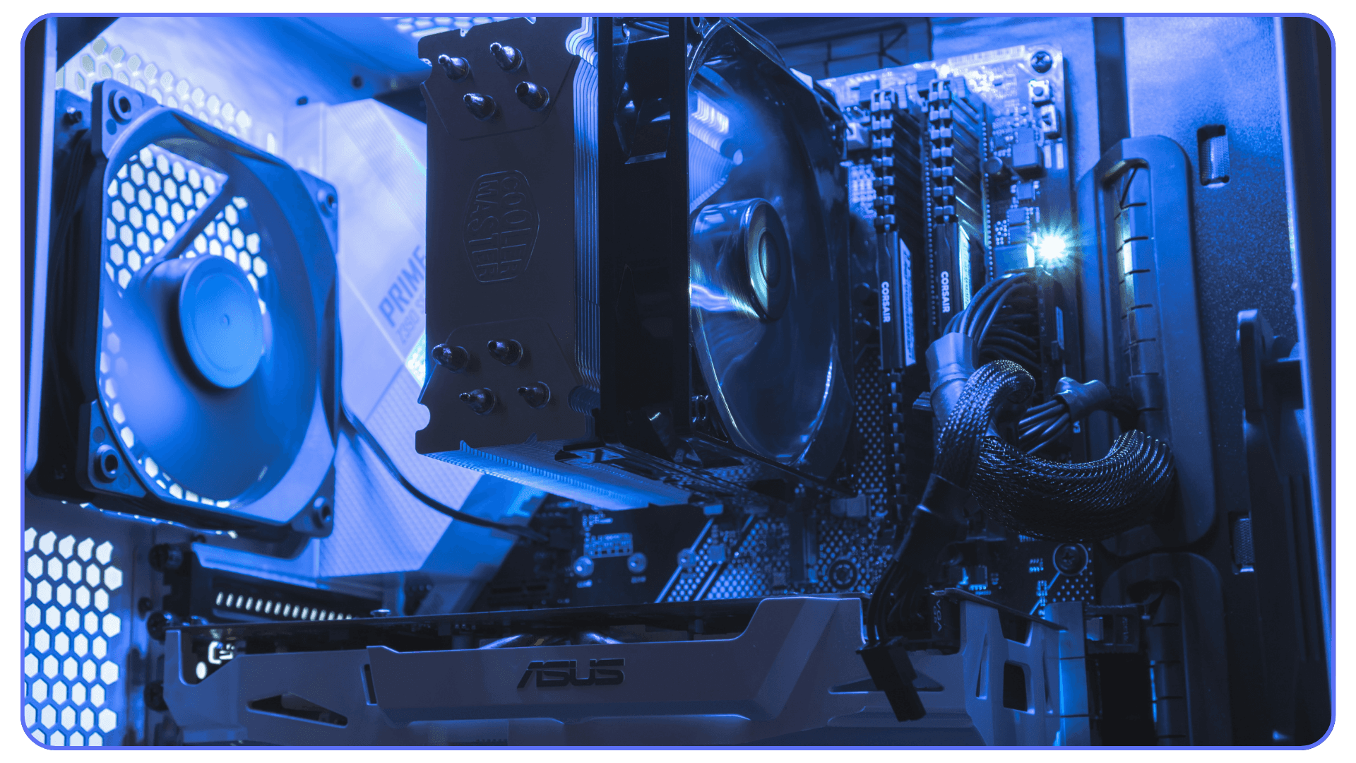Close-up of a custom-built desktop PC with ASUS components, cooling fans, and LED lighting — representing a high-performance setup optimized for AutoCAD and 3D workflows.