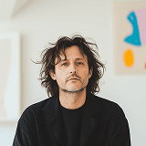 Creative professional portrait with abstract wall art background