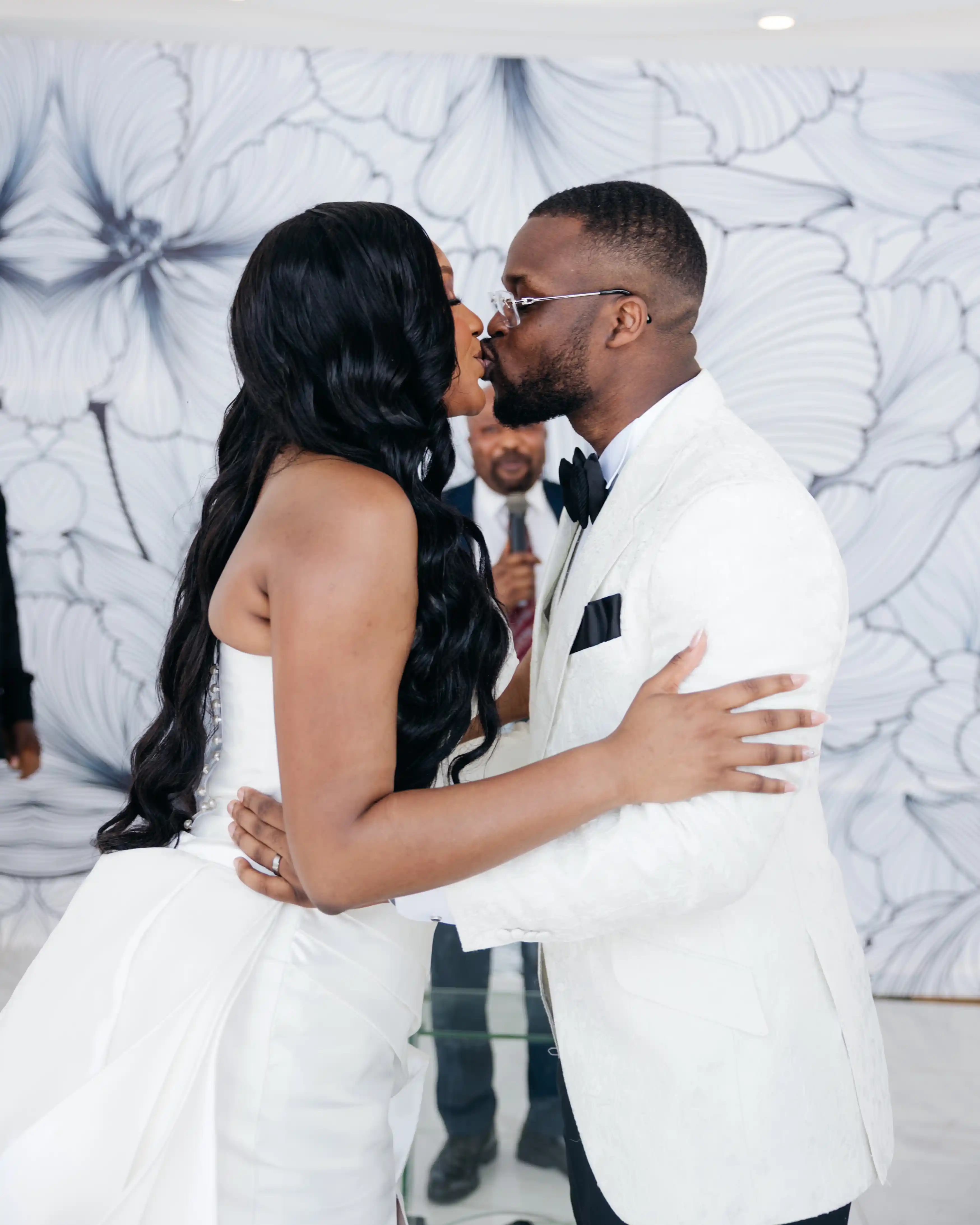 Bride and groom celebrating a luxury wedding coordinated by Victoria Brooks Events, a premium wedding planner in Nigeria.