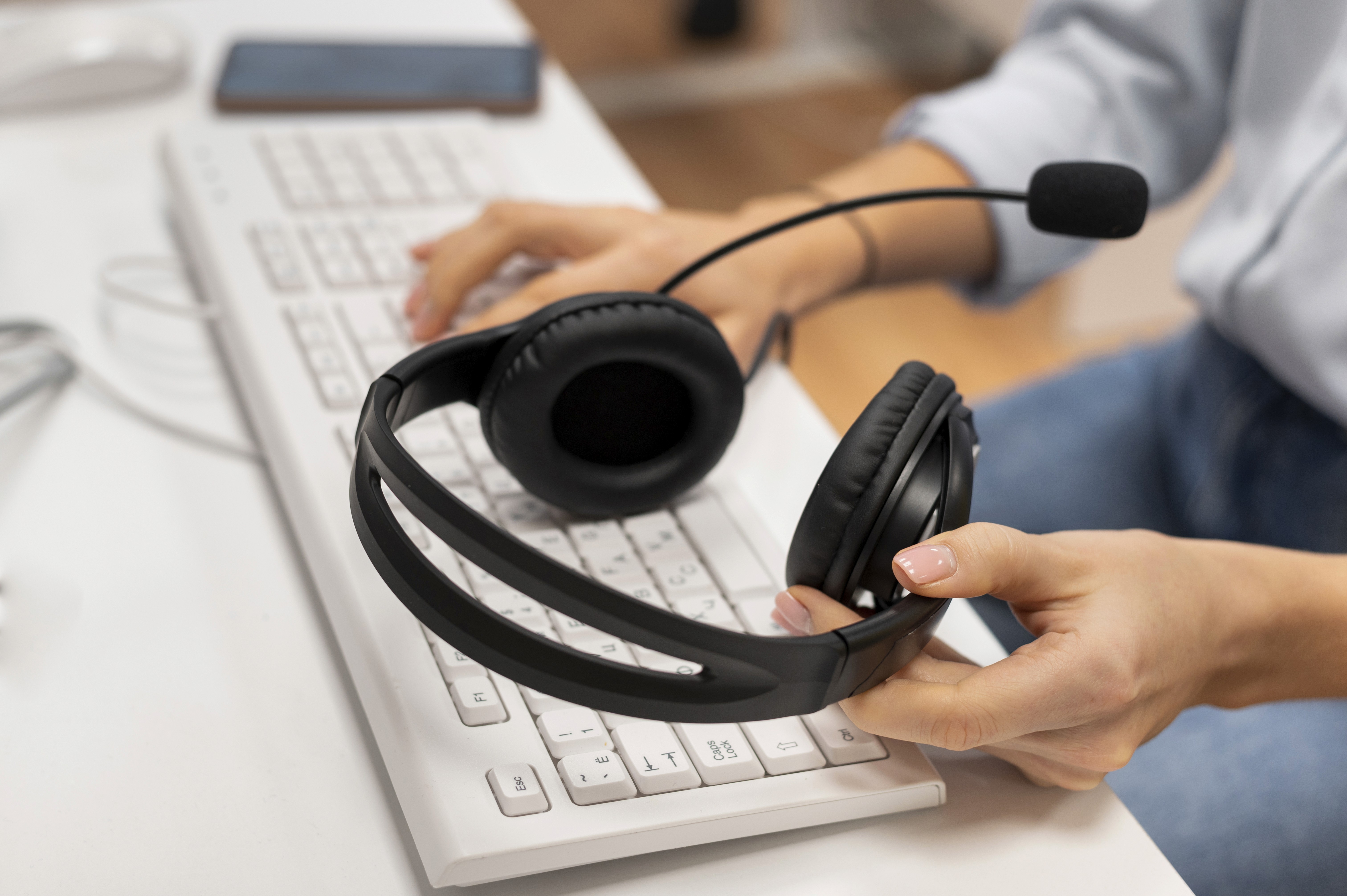 Women in call center holding headset