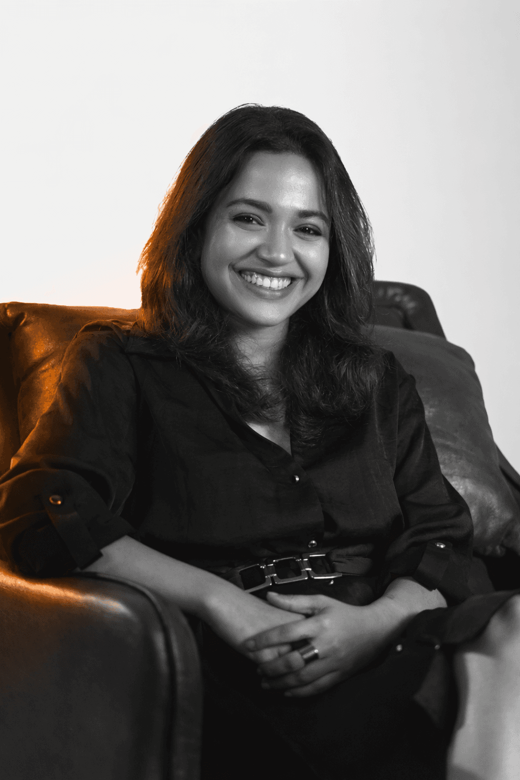 person wearing blue top smiling