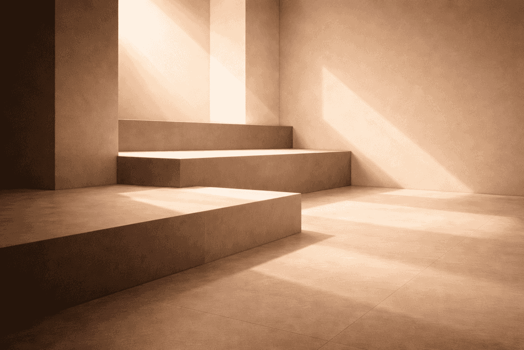 two people sitting at a table with laptops