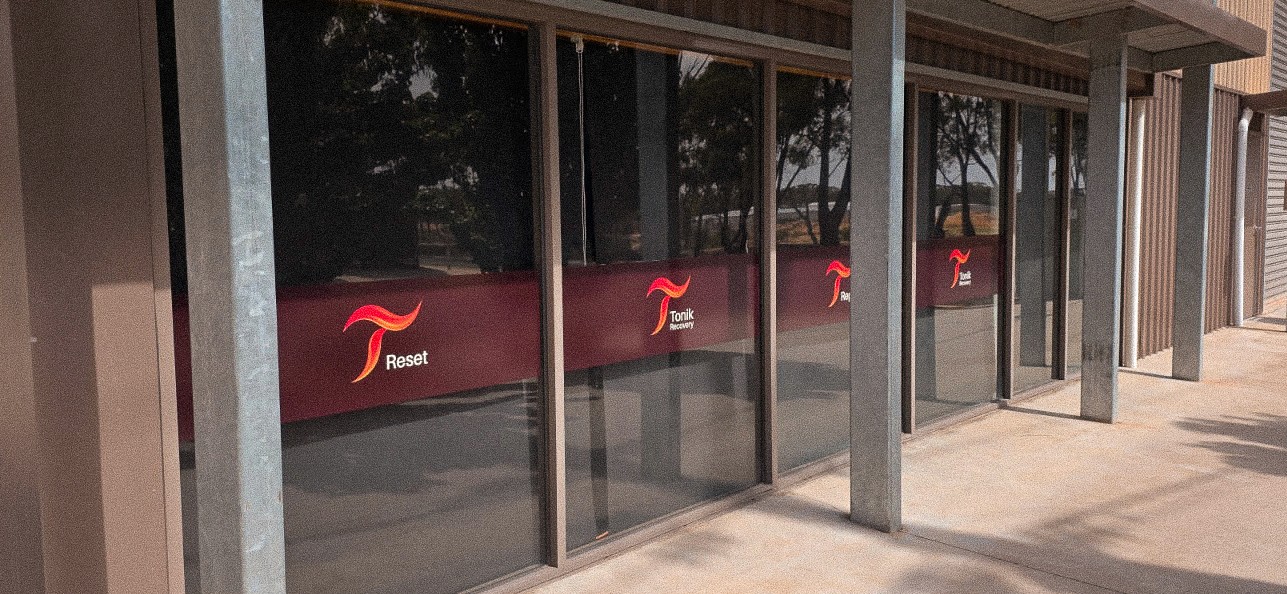 Woman in athletic wear doing high knee exercise