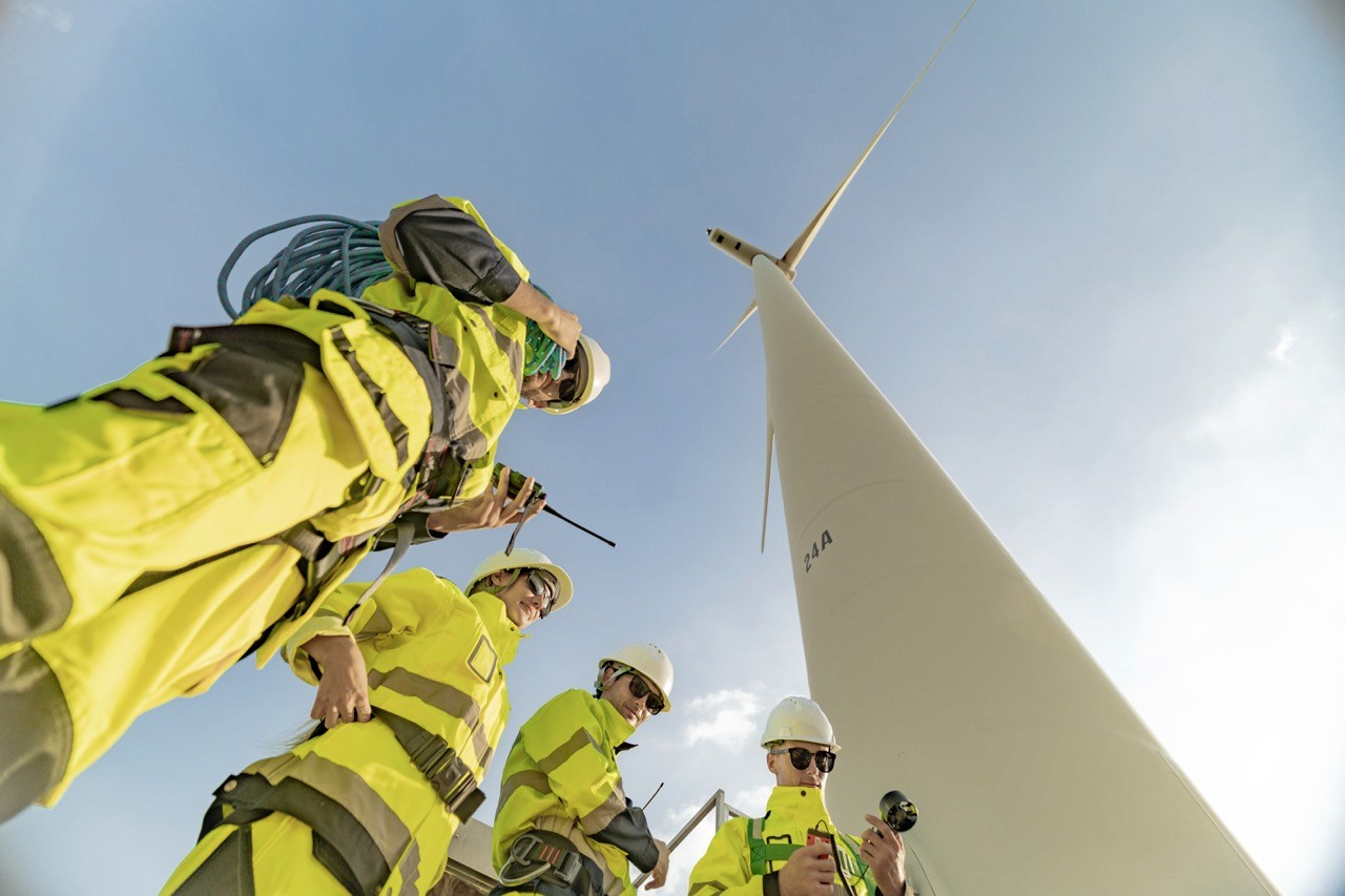 engineers working on a solar panel