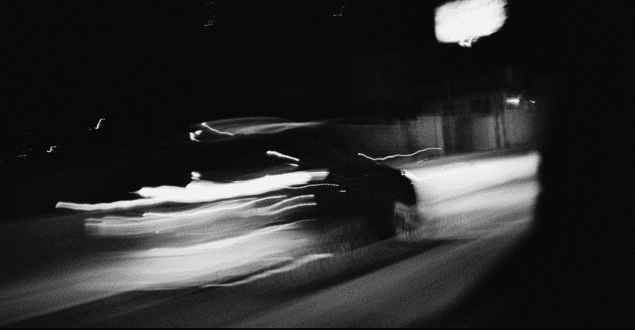 a car speeding through the streets in Monterrey Mexico