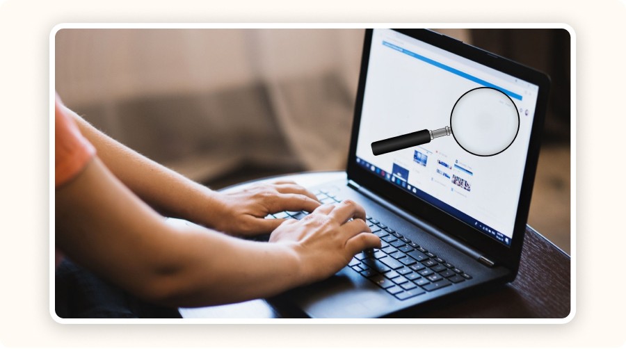 laptop with a magnifying glass