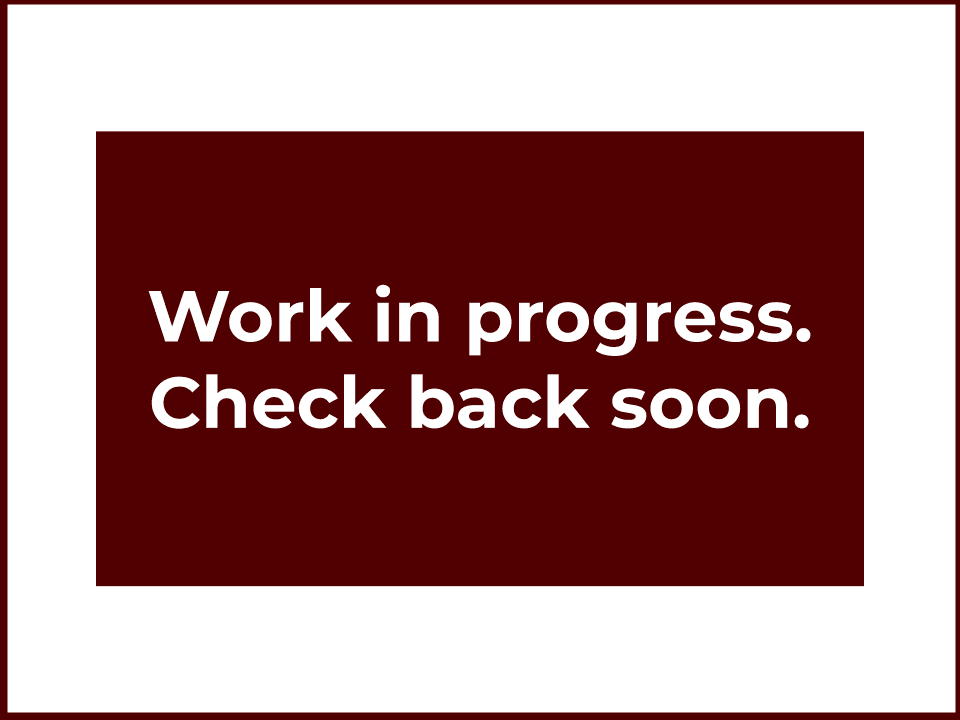 Couple shopping for gourds at an outdoor market.