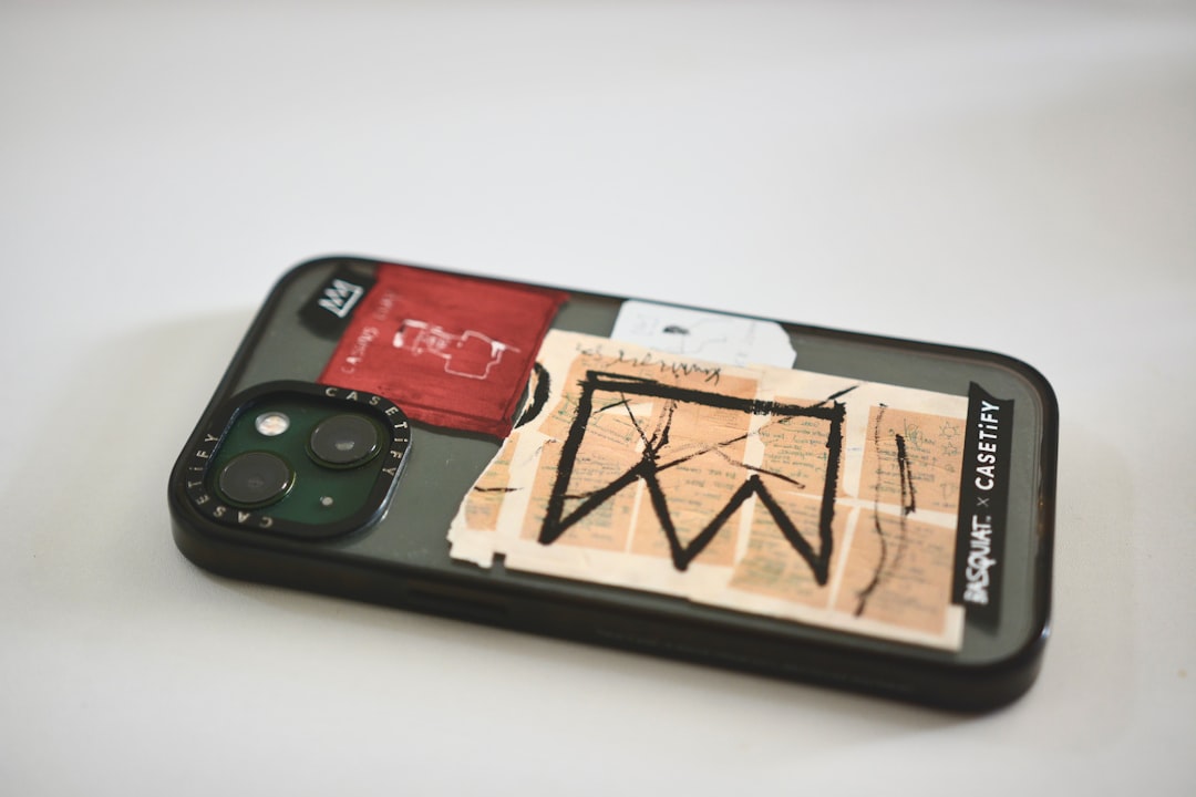 A cell phone with a picture of a cross on it