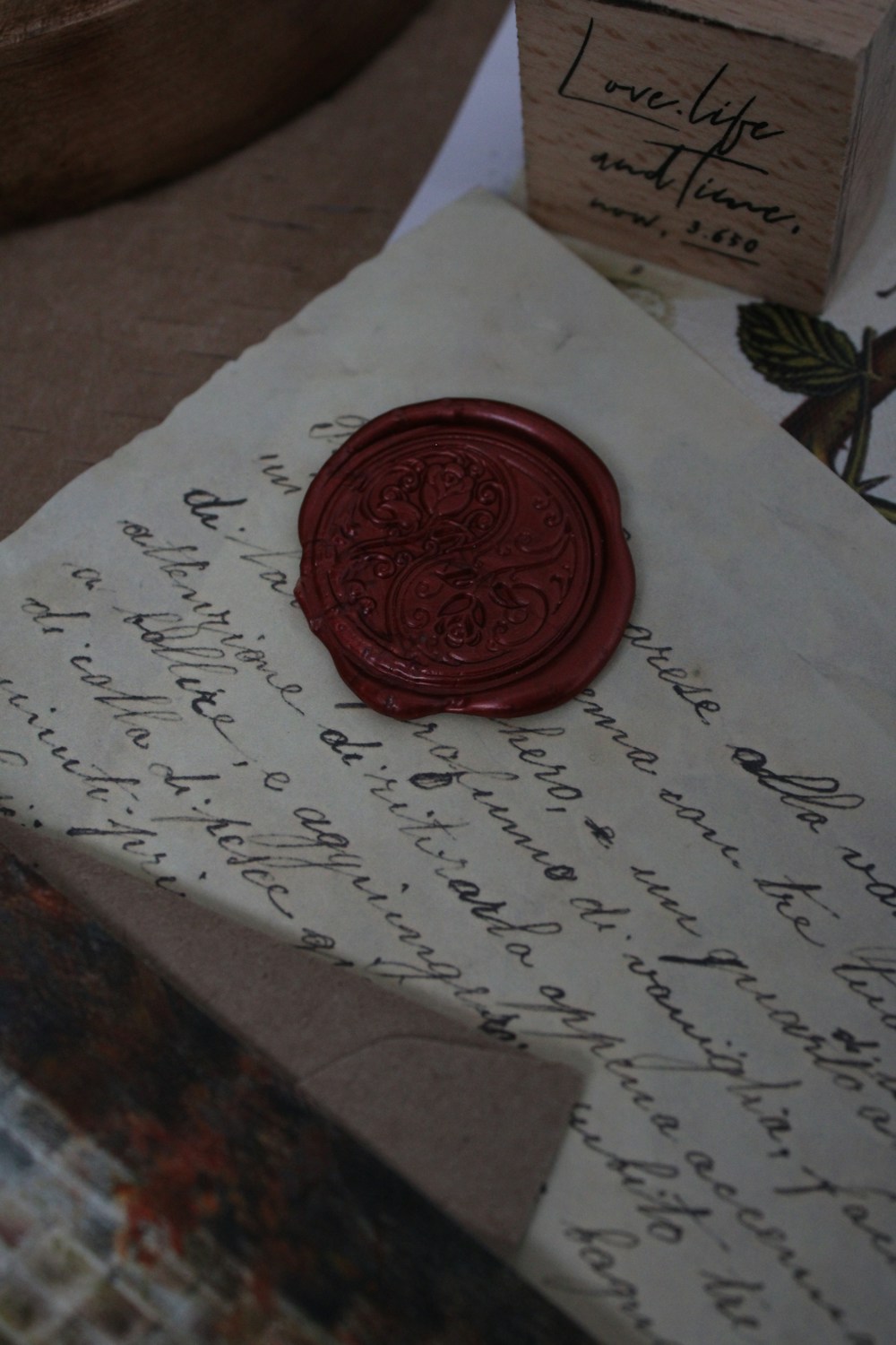 A handwritten letter sealed with red wax