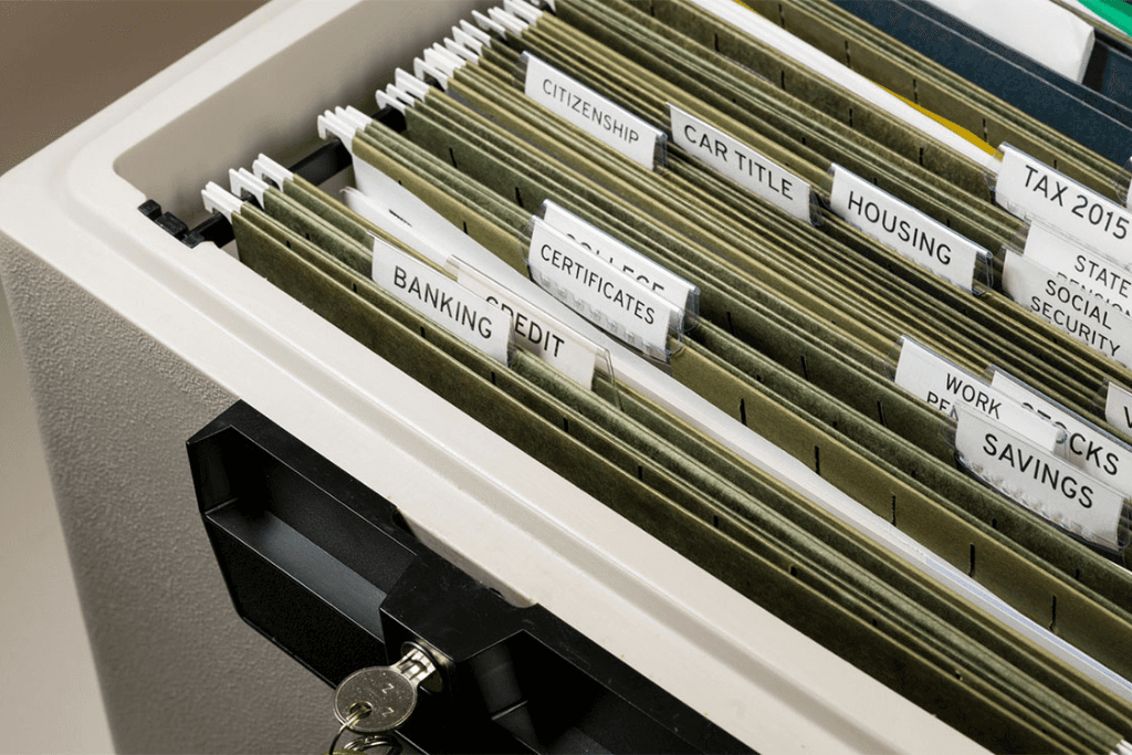 Close up of a well organized home filing system with tabs for each subject with focus on social security