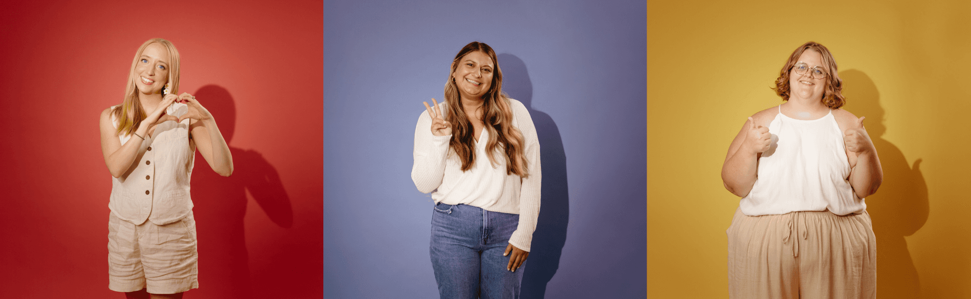 Kidsister's female founders in their photo studio on custom backdrops suited to their favorite color