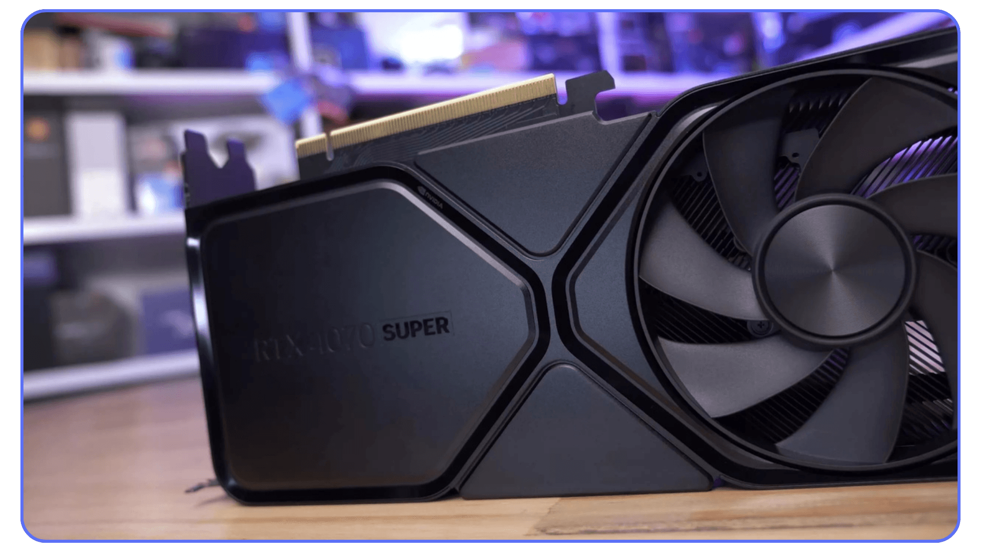 Close-up of an NVIDIA RTX 4070 Super graphics card with a prominent fan and sleek black design.