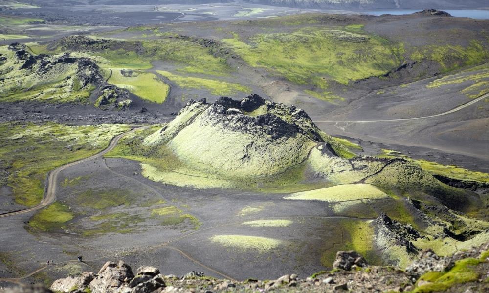 Aerial photograph of moss-covered Laki craters (Lakagígar) in Iceland, showing volcanic cones, black lava fields, and fissure terrain formed during the devastating 1783 Laki eruption.
