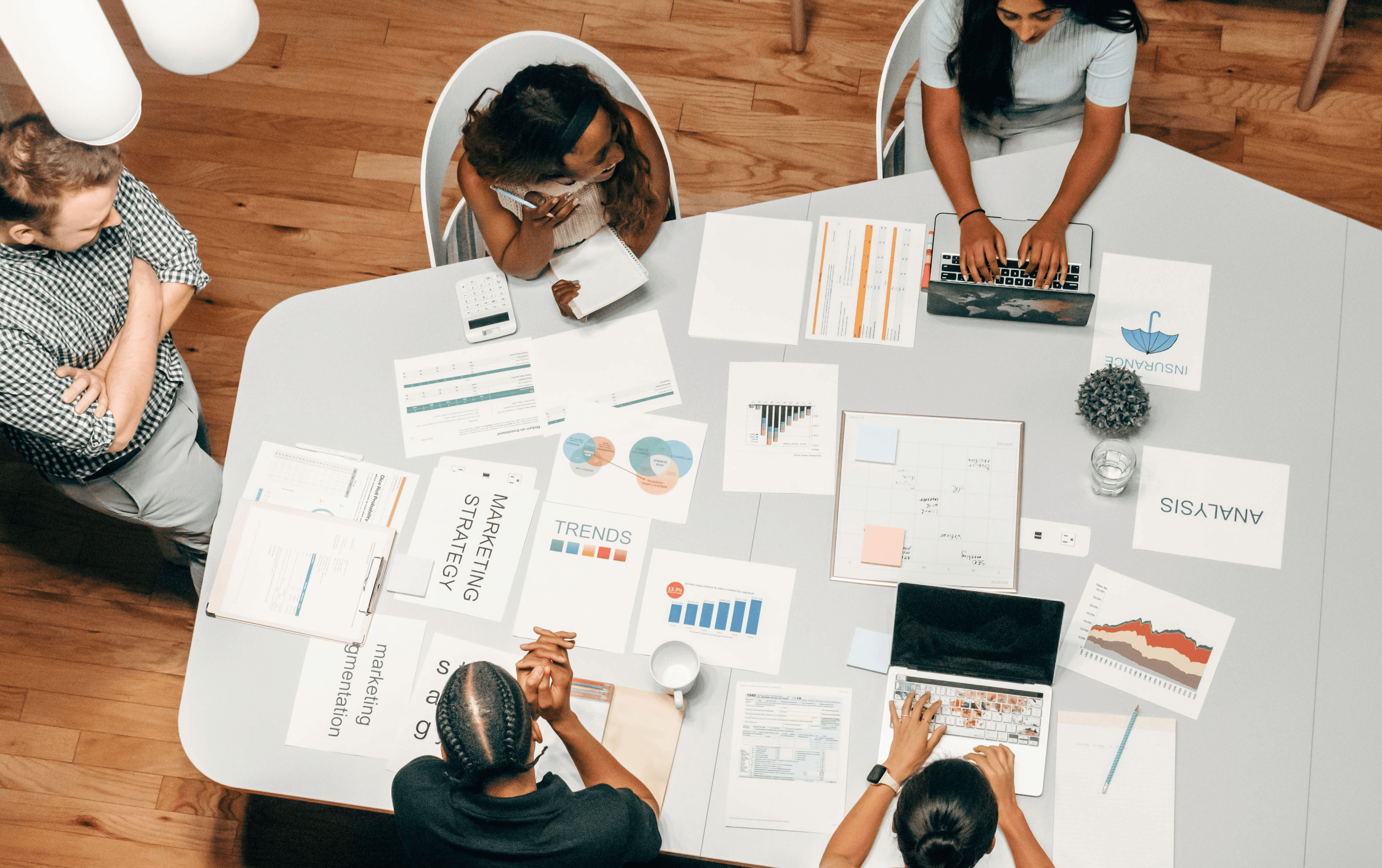 A Group of People Having a Meeting in the Office
