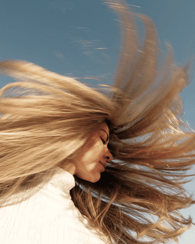 a close up of a person with a cell phone