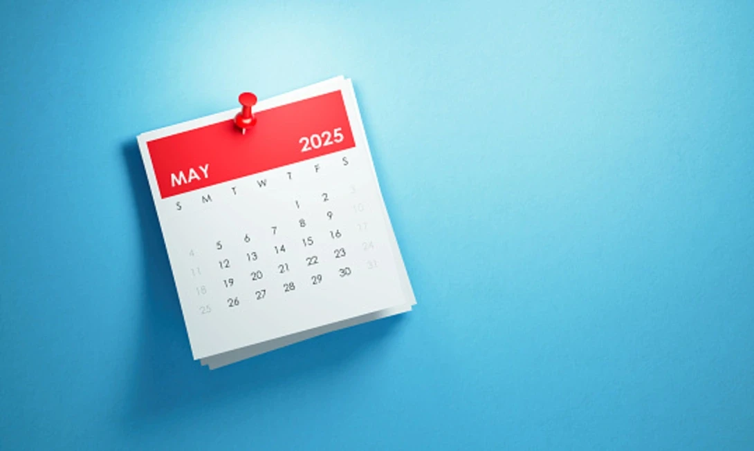 Calendar marked May 2025, representing upcoming spring travel and mountain events ideal for Avo Limo private car services.