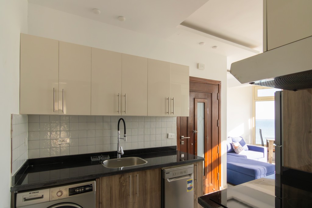 white and brown concrete building under blue sky during daytime