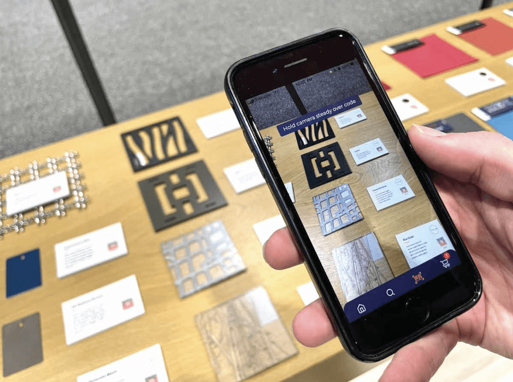 A person scanning samples with their phone.