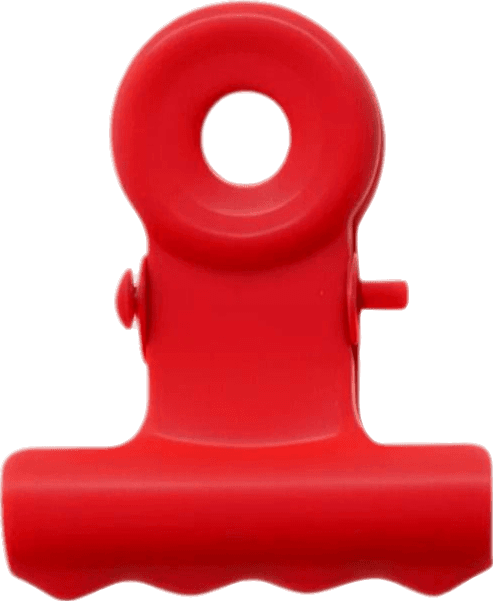 A red binder clip