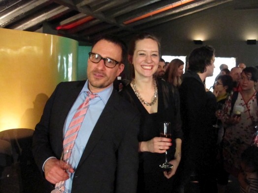 a man and a woman at the exhibition gallery