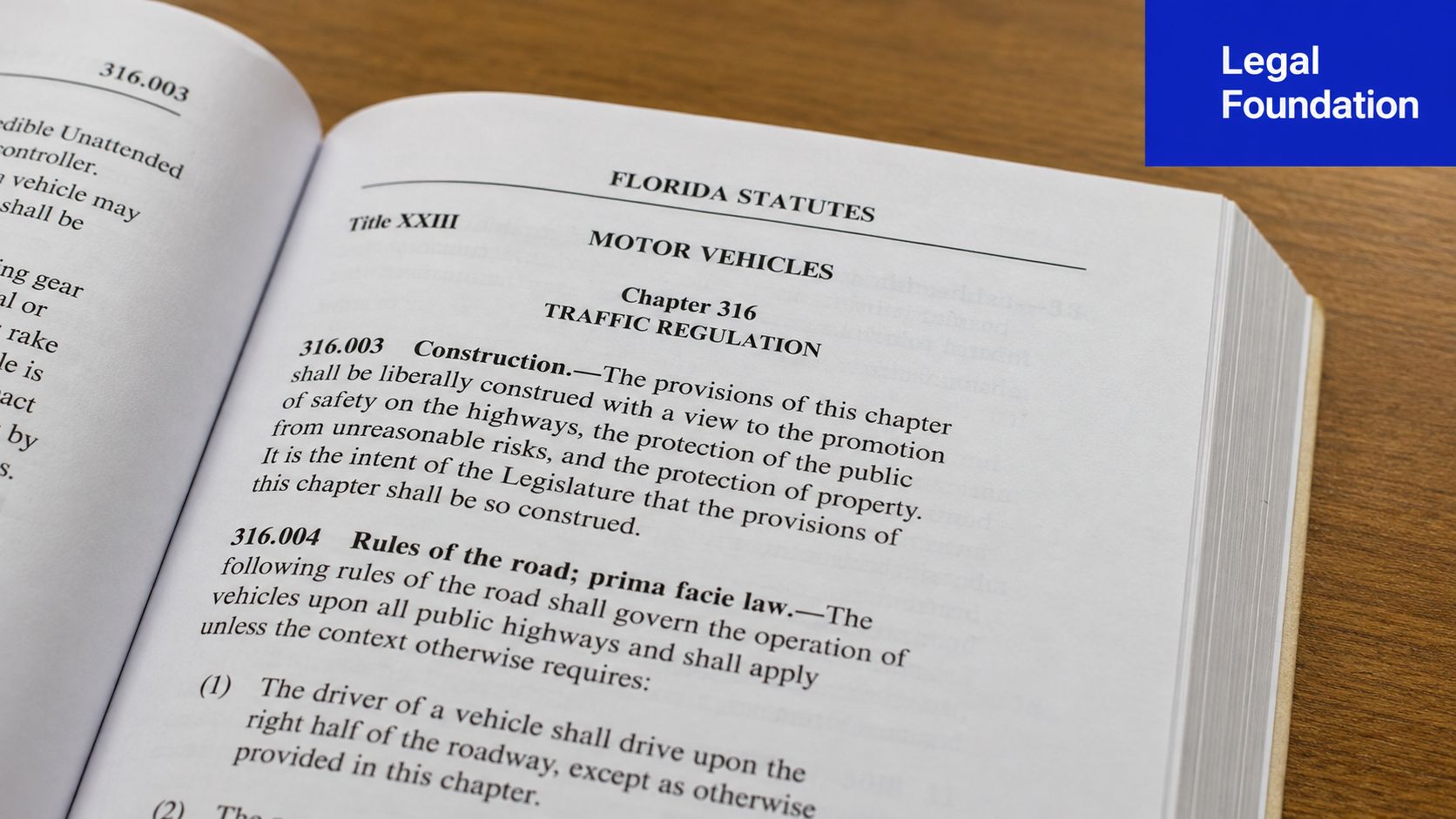 A close-up view of an open law book displaying Florida Statutes regarding traffic regulations and road rules.