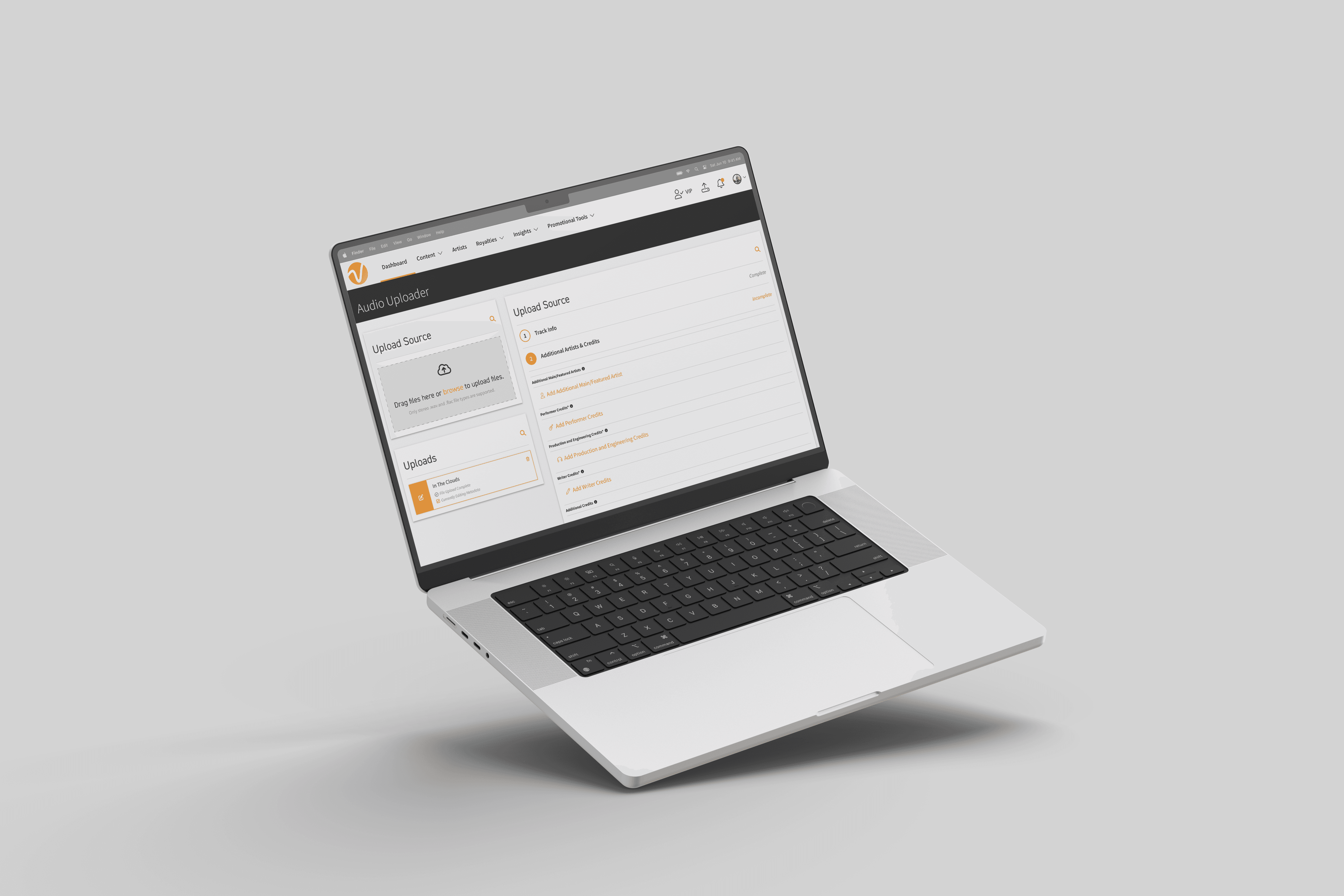 a laptop showing screen of auido uploader