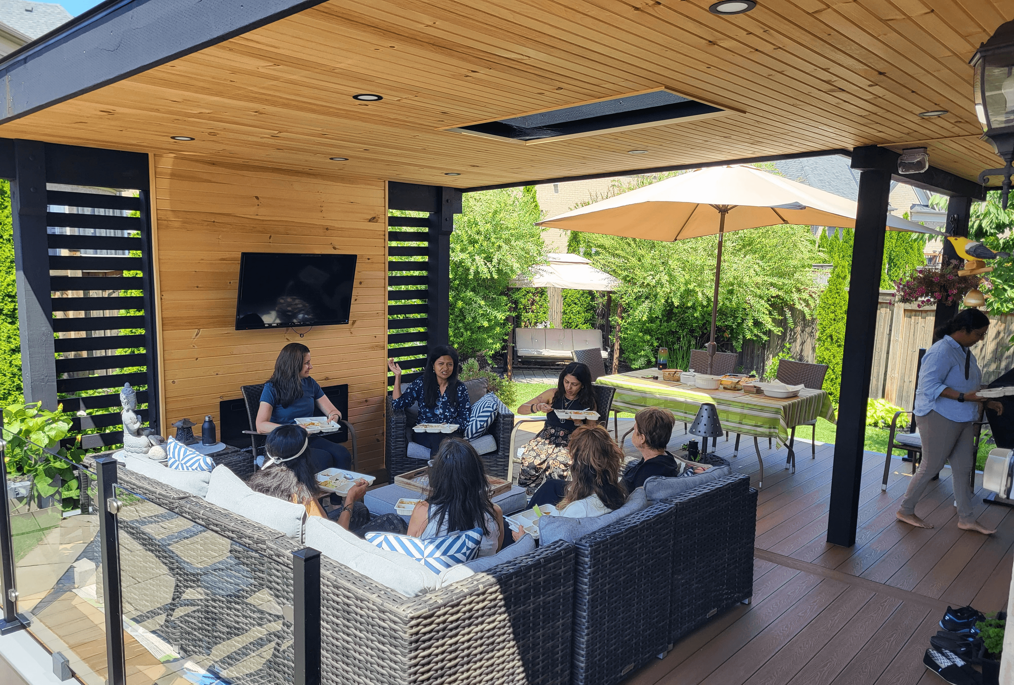 A luxurious indoor pool area with a panoramic view of a city at sunset. Comfortable lounge beds with soft fabrics surround the pool, while warm ambient lighting enhances the sophisticated atmosphere. The space combines modern elegance with a tranquil vibe.