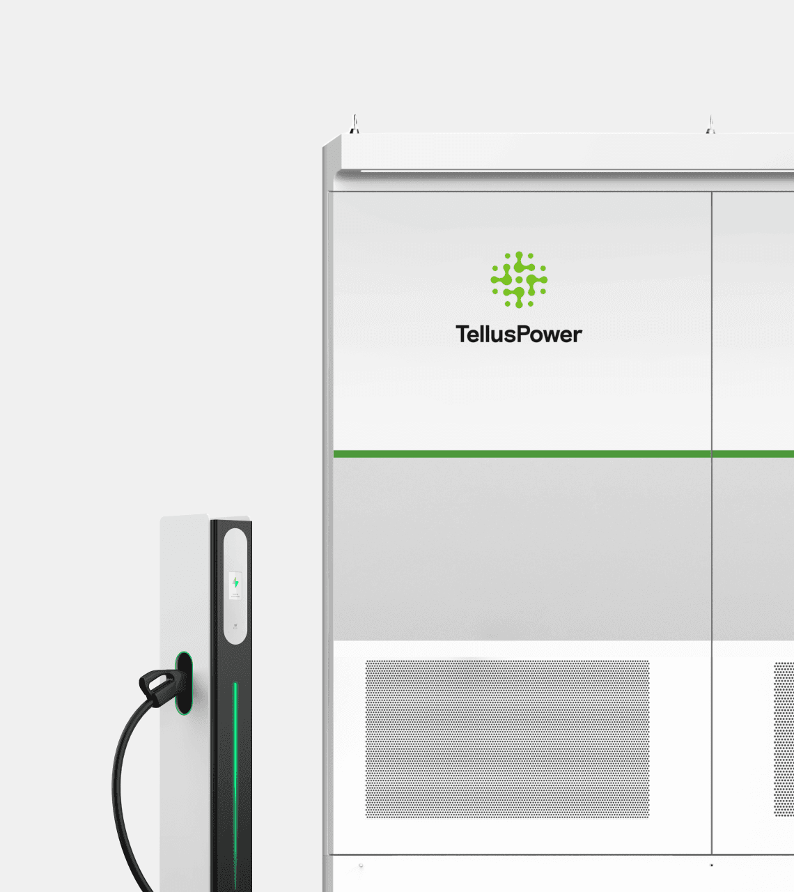 A smiling woman with her arms crossed, standing against a dark green background. She has long, dark hair.